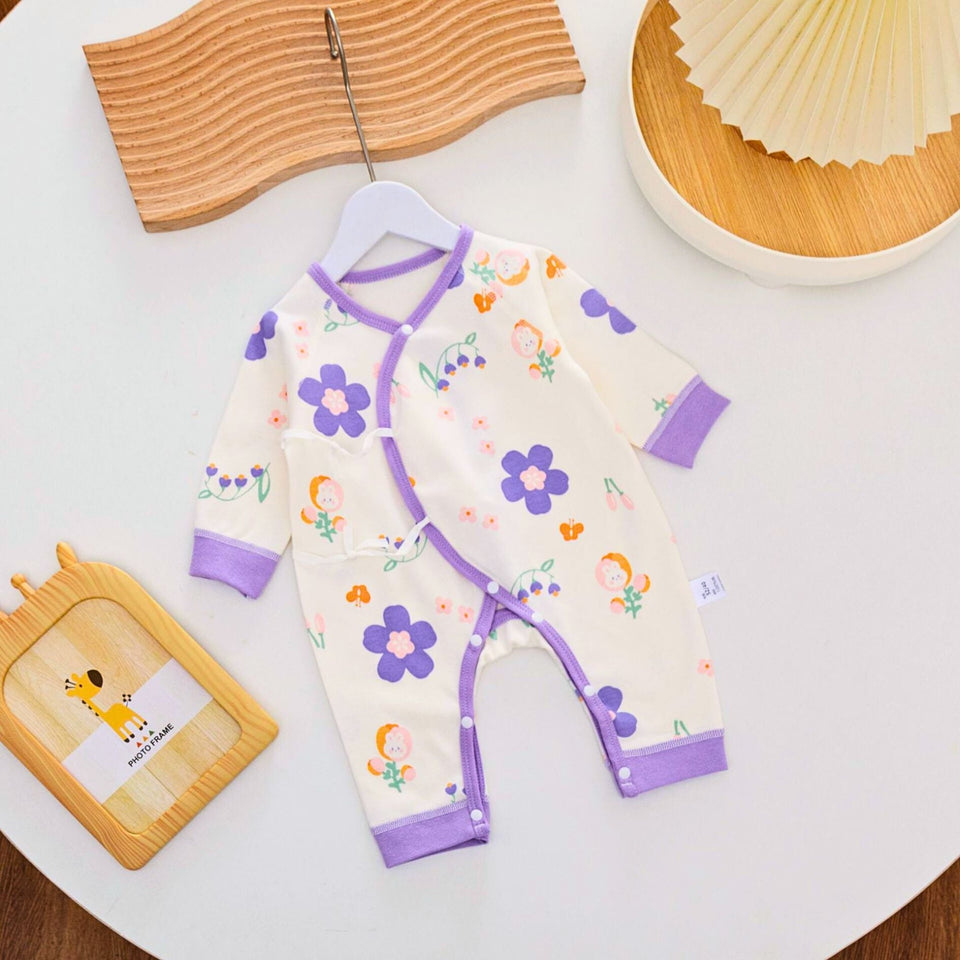 Lavender Bloom Baby Girls Romper by Ju Ju Jam ā A soft and stylish romper in lavender with a floral design, perfect for baby girls.