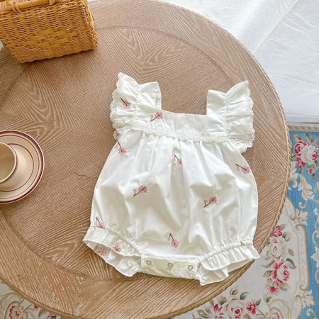 Ju Ju Jam's White Lace Romper: Delicate Details for Little Ones