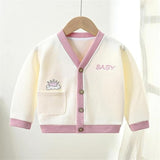 Ju Ju Jam Lovely Little Knitted Baby Girls Cardigan, perfect for layering with its soft texture and adorable design.