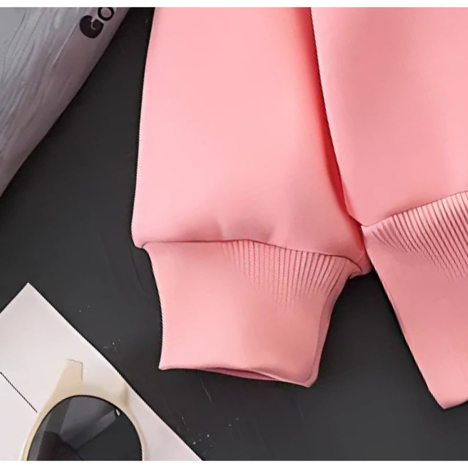 Flat lay of the Blush Baby Girls Collared Top by Ju Ju Jam, highlighting its pastel blush tone and classic collar.