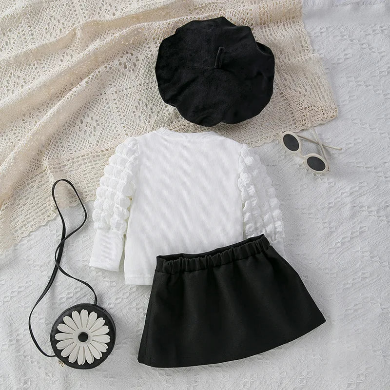 Ju Ju Jam's Mini Stylish Girls Top & Skirt Set with Hat styled for a chic, casual look perfect for little girls.
