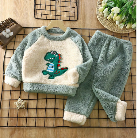 Cozy Dino Boys and Girls Plush Set featuring a playful dinosaur design, perfect for warmth and comfort from Ju Ju Jam.