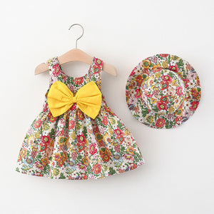 Adorable kids' dress in red with contrast bow and matching hat by Ju Ju Jam