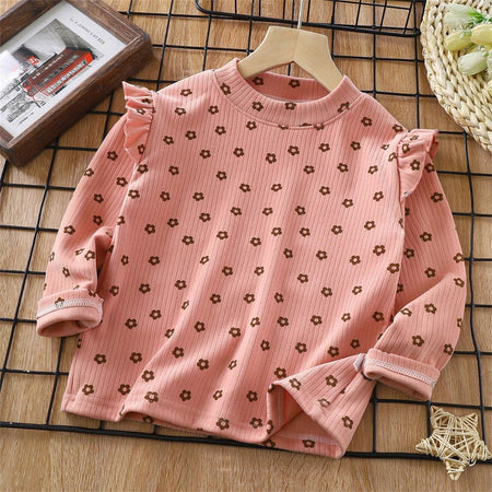 Little Lady Girls Peach Blossom Top from Ju Ju Jam, paired with jeans to highlight its versatility for kids' fashion.