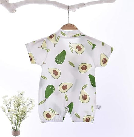 Infant dressed in a playful avocado print romper from Ju Ju Jam.