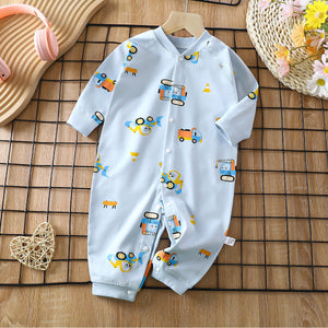 Baby boy and girl in a Blue Crane romper from Ju Ju Jam