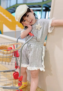 Everyday cotton two-piece set for girls by Ju Ju Jam, including a breathable top and coordinating pants or shorts for a relaxed and stylish look.