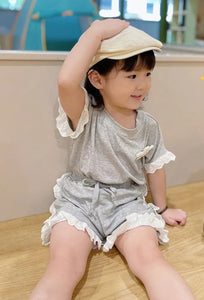 Ju Ju Jam girl's two-piece clothing set made from soft cotton, comprising a top and matching bottoms ideal for everyday wear.