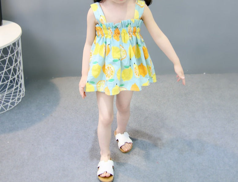 Cute Delicate Lemon Girls Dress - Light and breezy dress for baby girls with a lemon pattern, ideal for summer, at Ju Ju Jam.