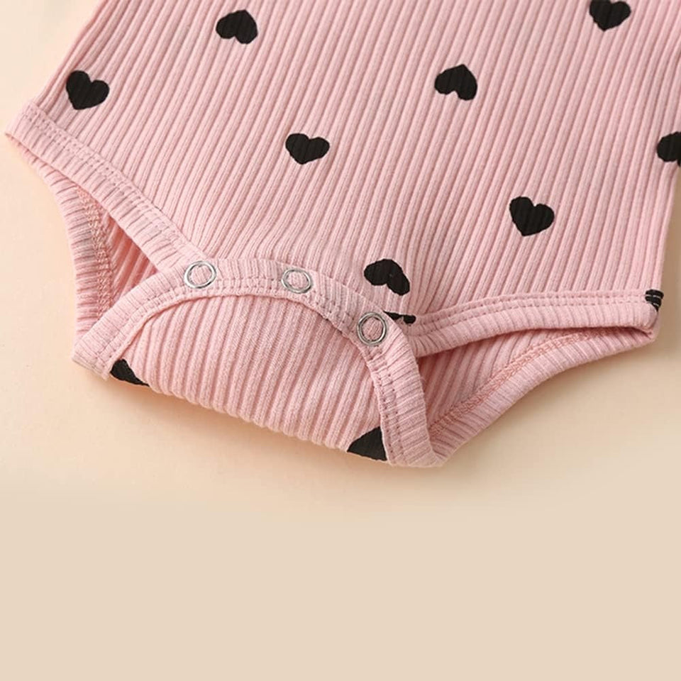 Stylish baby girls romper and pant set with ruffle sleeves and head bow from Ju Ju Jam – perfect for a charming, coordinated outfit