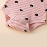 Stylish baby girls romper and pant set with ruffle sleeves and head bow from Ju Ju Jam – perfect for a charming, coordinated outfit
