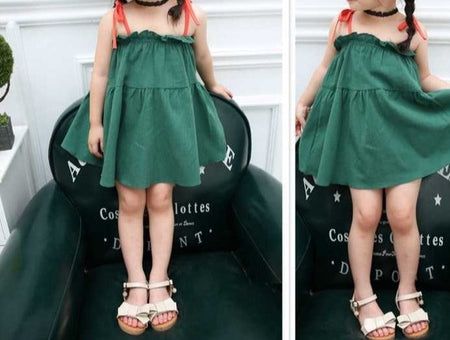 Elegant Green Dress with Tie Sleeves - Delightful dress for baby girls with adjustable tie sleeves and a rich green hue, perfect for any occasion, found at Ju Ju Jam.