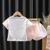 Ju Ju Jam's Blush Baby Girls Collared Top styled with leggings, creating a comfy and adorable look for toddlers.