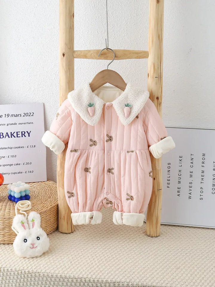 Stylish pink puffer baby girls' romper with a charming bunny sling, perfect for chilly days, by Ju Ju Jam.