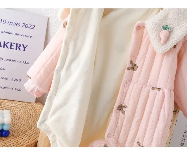 Ju Ju Jam pink puffer romper for baby girls, designed with a cozy fit and an adorable bunny sling.