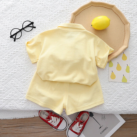 Sweet pastel co-ord set for baby girls by Ju Ju Jam, featuring a top and bottoms with 3D flower details for a stylish and charming outfit.