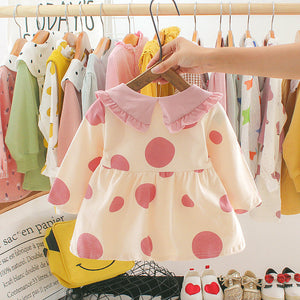 Girls' pink dress with polka dots and pineapple print from Ju Ju Jam