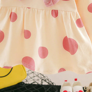 Adorable pink girls' dress with polka dots and pineapple pattern by Ju Ju Jam