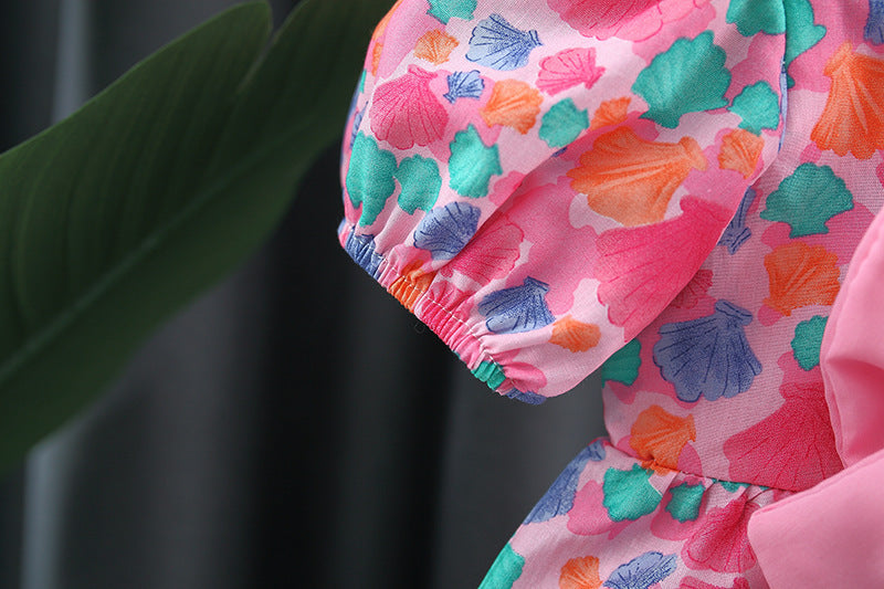 Close-up of puff sleeves and bow detail on girls' dress - Ju Ju Jam