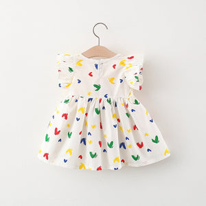 Charming Red Dress with Hearts and Bow for Girls - Features a playful heart print and a red bow accent, ideal for adding a touch of sweetness to any outfit, at Ju Ju Jam.