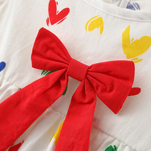 Baby girls' Red Hearts Dress with Bow - Stylish dress with a bold red color, heart patterns, and a cute bow detail, perfect for making any occasion special, available at Ju Ju Jam.