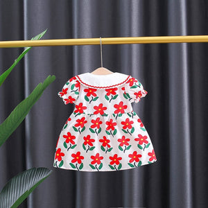 Charming Red Dress with Sling and Flower Design for Girls - Features a bright red color, floral patterns, and a sling strap for a trendy look, ideal for celebrations, at Ju Ju Jam.