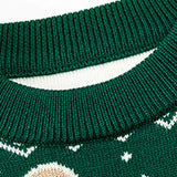 Winter Cozy Boys and Girls Green Sweater worn by kids enjoying a snowy day, offering comfort and style.