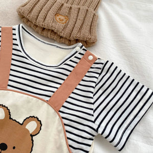 Sweet baby boy dressed in a Striped Bear dungaree romper, designed for comfort and style from Ju Ju Jam.