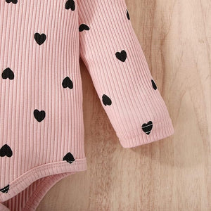 Ju Ju Jam's ruffle sleeves baby girls romper and pants set, complete with a matching head bow, designed for a sweet and stylish look.