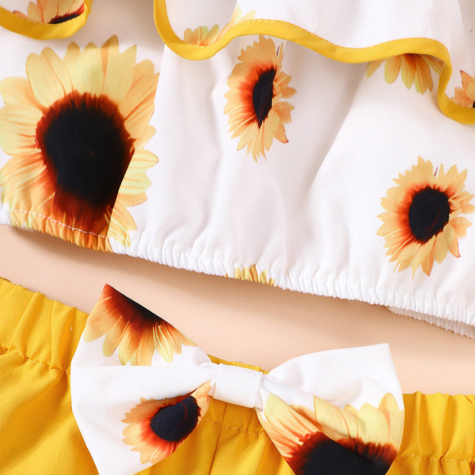 Sun-Kissed Girls Set from Ju Ju Jam – Delightful two-piece set with a cheerful top and shorts, perfect for adding a splash of sunshine to summer outfits.