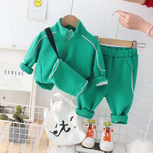 Ju Ju Jam boys' sweat suit with matching bag, featuring a cozy sweatshirt and pants set for stylish comfort.