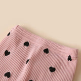 Ju Ju Jam's baby girls romper and pant set with ruffle sleeves and head bow, offering both comfort and elegance for any occasion.