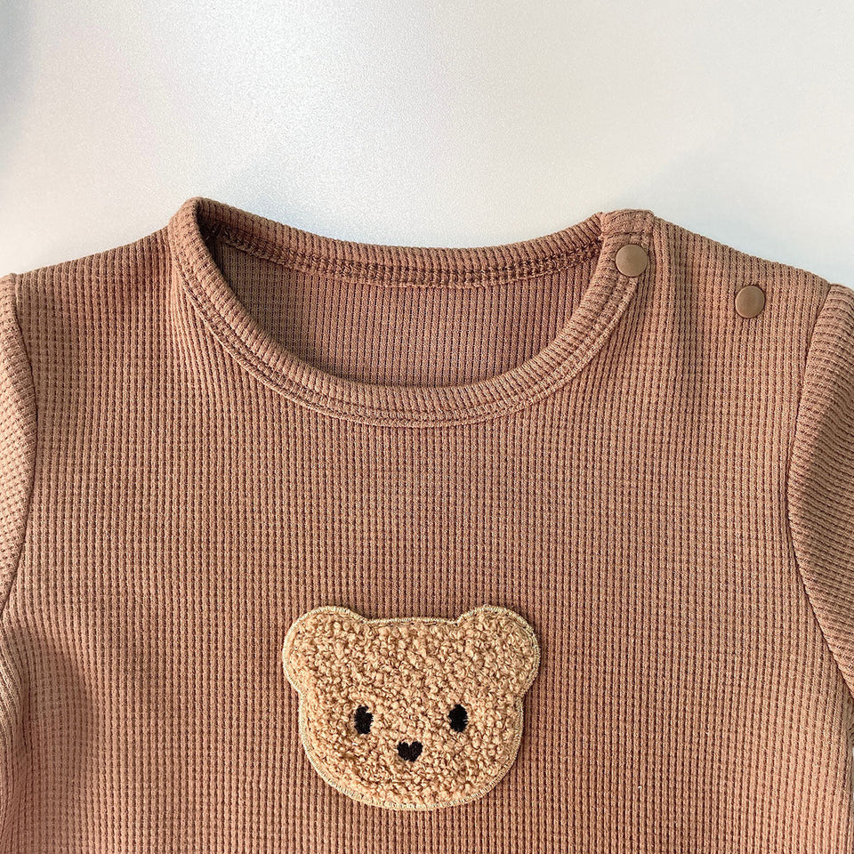 Teddy Bear Pocket Romper with Hat for Boys and Girls by Ju Ju Jam - Fun and stylish romper set with a teddy bear pocket and hat.
