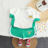 Ju Ju Jam boys' outfit with a Tiger T-shirt featuring a 3D tail and coordinating shorts