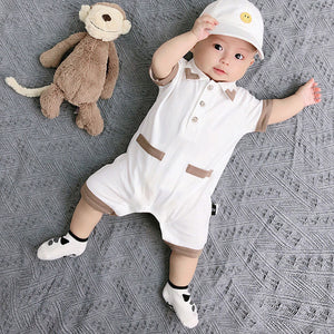 White Collared romper for baby boys, featuring a stylish collar from Ju Ju Jam."