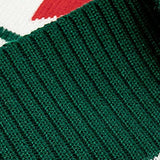 Winter Cozy Boys and Girls Green Sweater paired with a scarf and hat, creating a festive and warm outfit for the season.