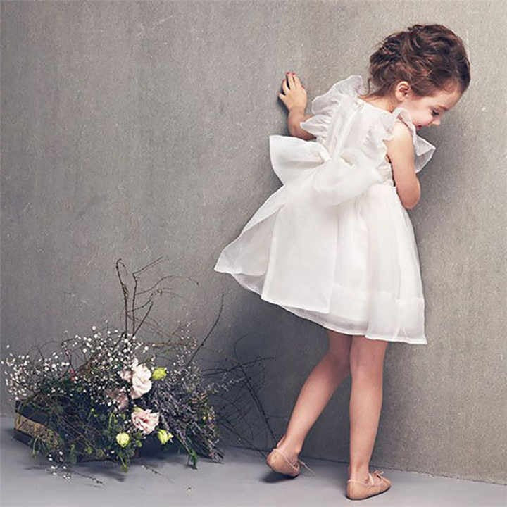 Lovely Back Bowknot Girls Mesh Dress by Ju Ju Jam, featuring a charming bow detail at the back for an elegant look.